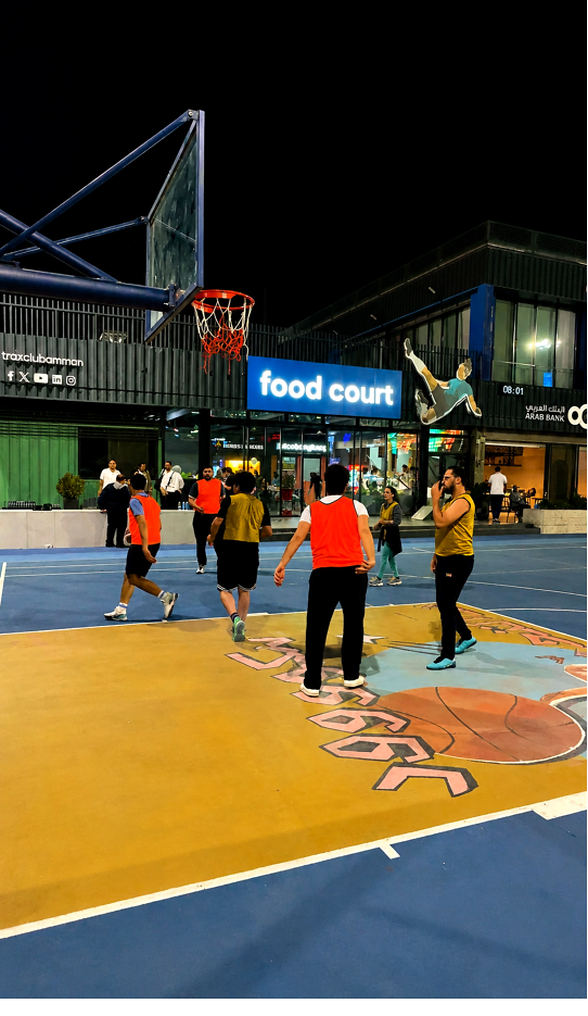 A volleyball match on the multi-use court at Trax